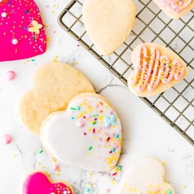 overhead view of Eggless Sugar Cookies over a marble surface