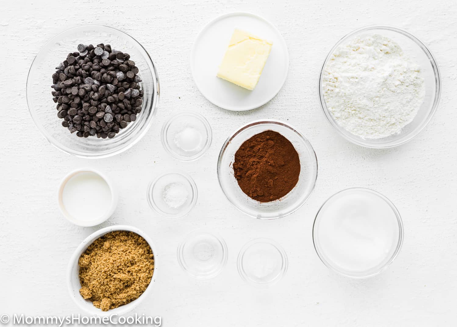 Eggless Triple Chocolate Peppermint Cookies ingredients on a white surface