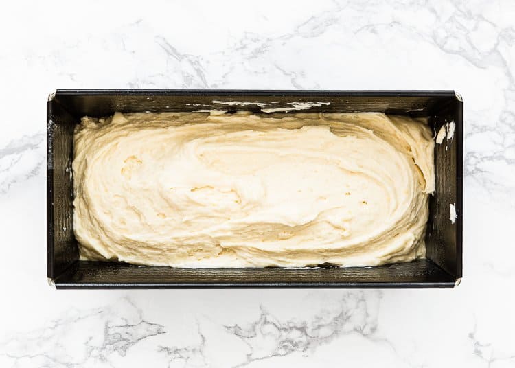 egg-free lemon pound cake batter in a loaf pan. 