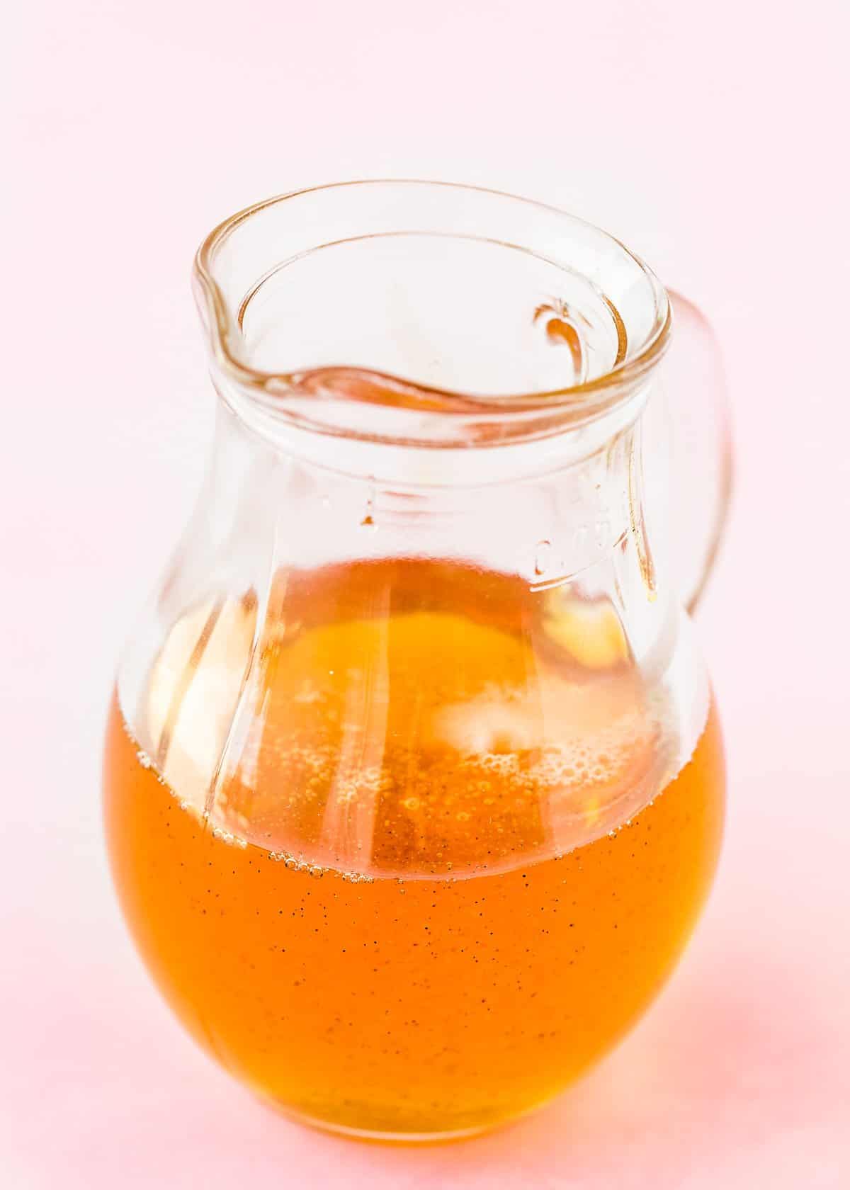 caramel sauce in a glass container.