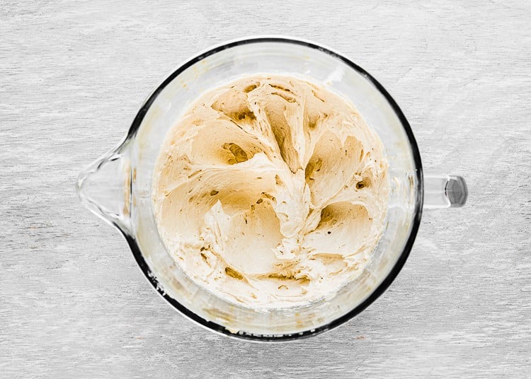 unsalted butter, cream cheese, sugars and vanilla creamed together in a bowl of a stand mixer. 