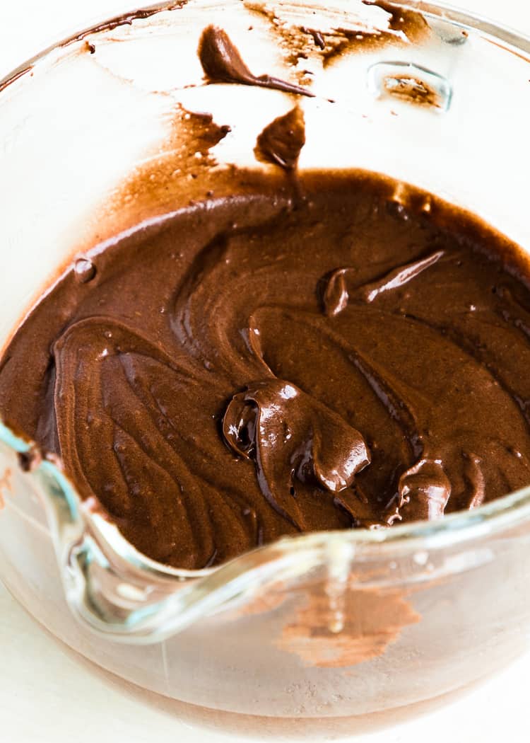 Egg-free chocolate cake batter in a bowl of a stand mixer. 