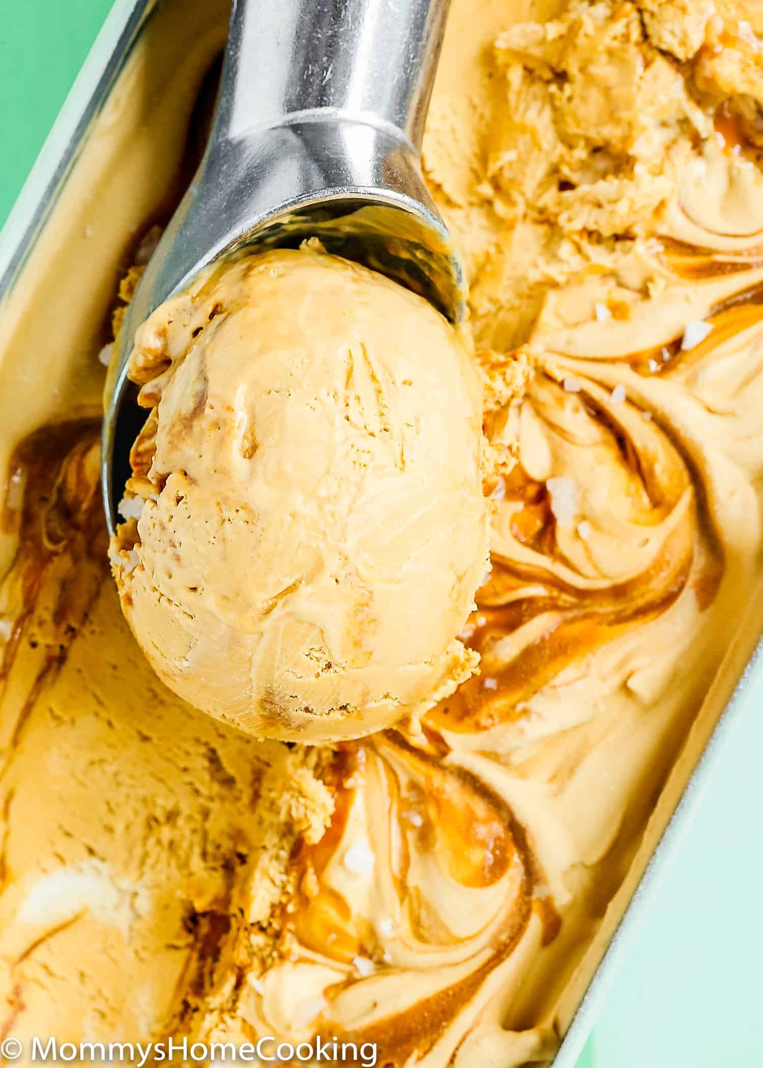 closeup of a ice cream scoop with Eggless Ice Cream.