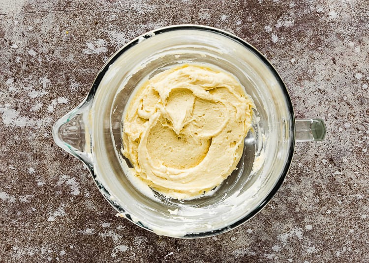 eggless cake batter in a bowl of a stand mixer. 