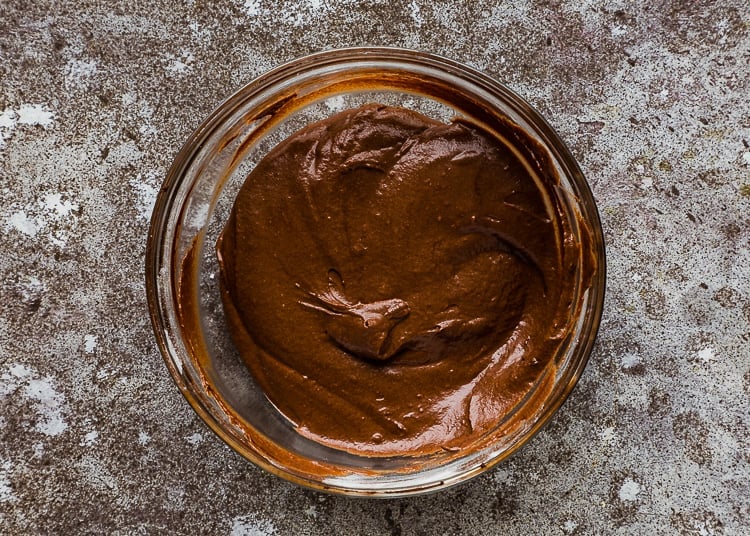 chocolate eggless cake batter in a bowl. 