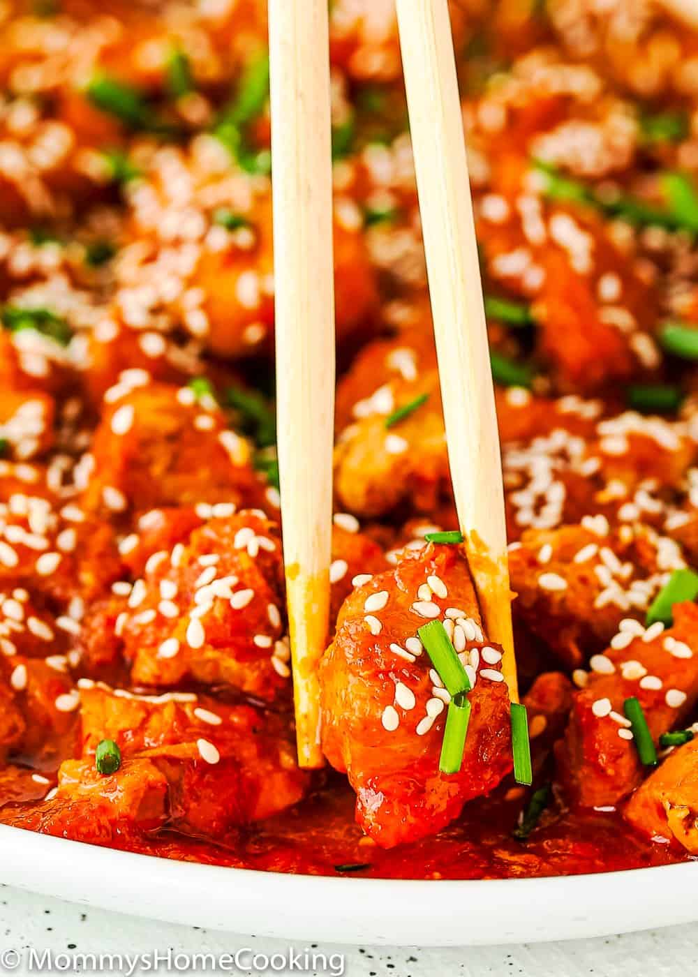 easy and tender Instant Pot Korean Kimchi Chicken and chopsticks