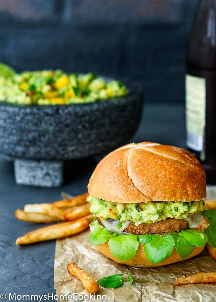 This Mango Guacamole Turkey Burger is a juicy goodness party for your taste buds! It’s tasty, smoky, and slathered in THE BEST mango guacamole ever. The perfect, delicious and healthier time-saving alternative to your barbecue spread. https://mommyshomecooking.com