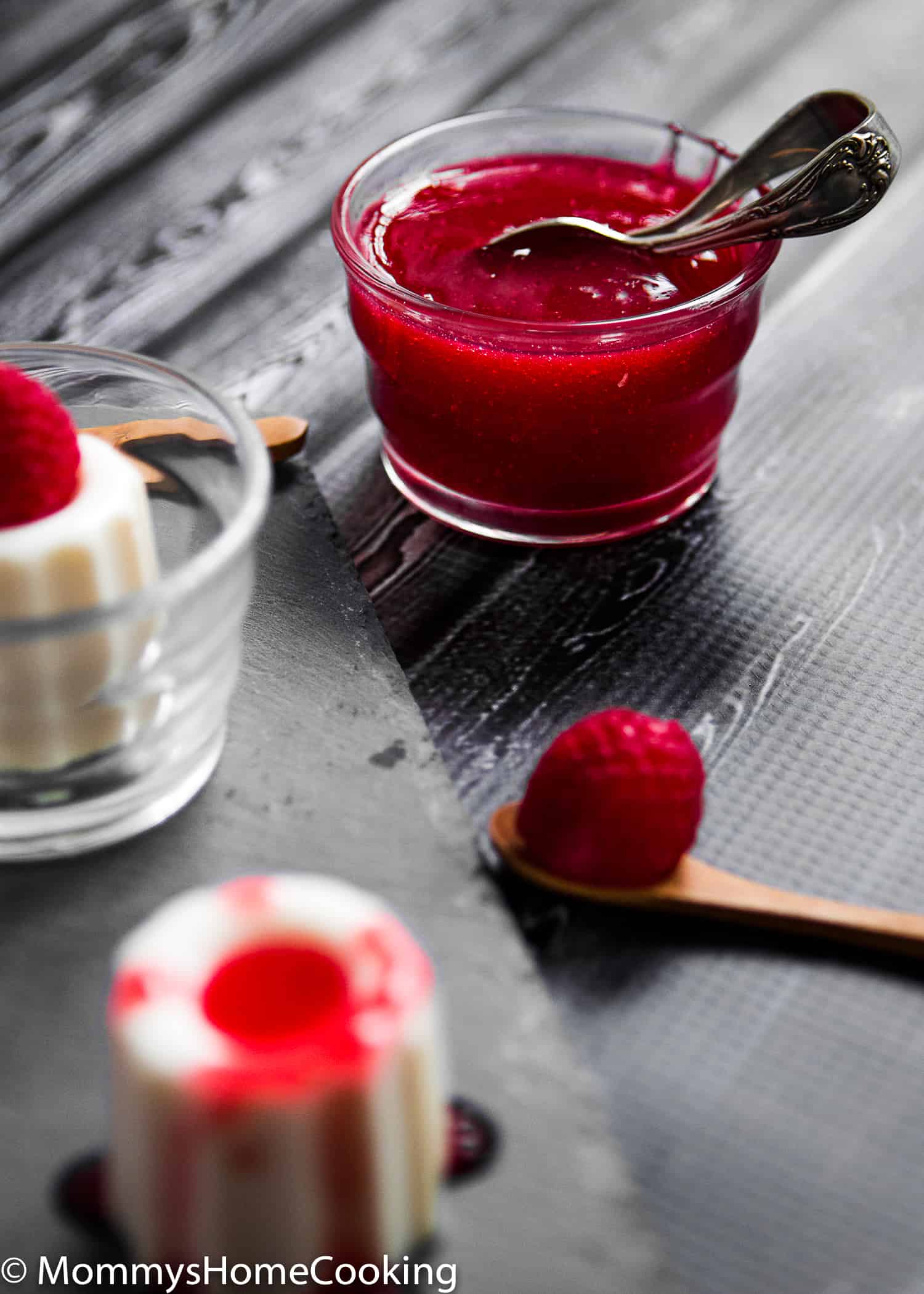 This Panna Cotta with Raspberry Coulis recipe is creamy, rich and silky! This amazingly creamy, melting in the mouth dessert is super easy to make with just 5 ingredients. https://mommyshomecooking.com