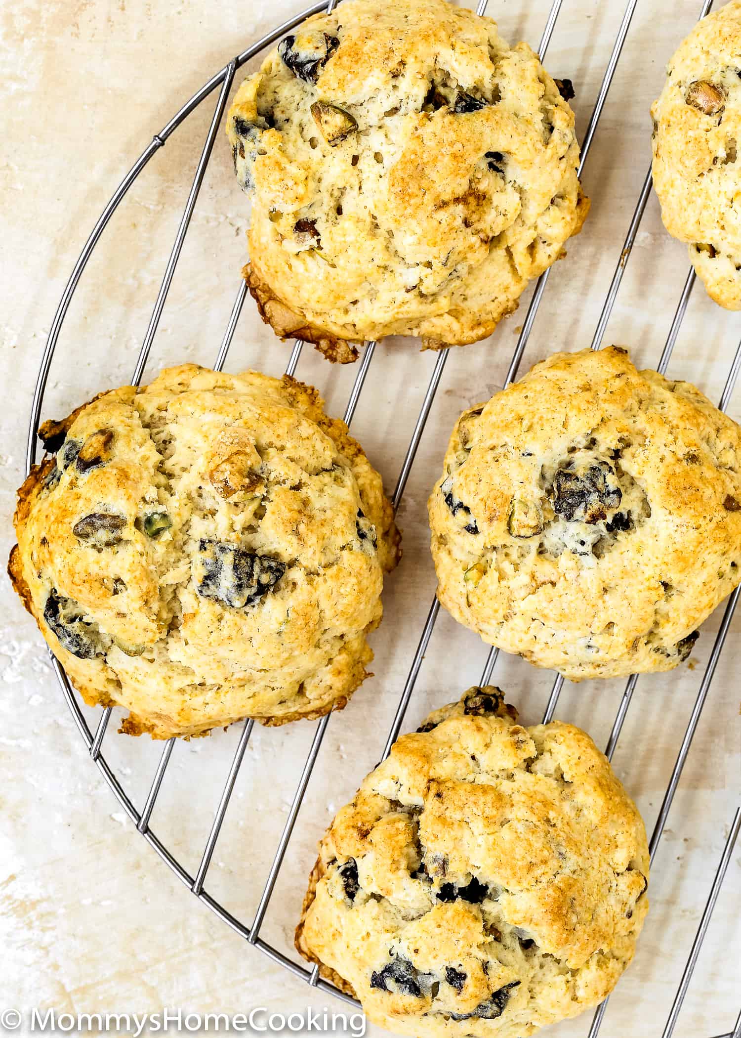 These Eggless Prune-Pistachio Scones are über buttery and flaky! Made from scratch with California prunes and pistachios, these scones make a delightful sweet treat for any occasion. They will be a big hit every time you make them. https://mommyshomecooking.com