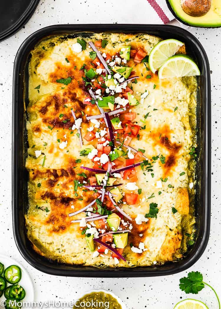  Easy Enchiladas Suizas in a baking dish with topping 