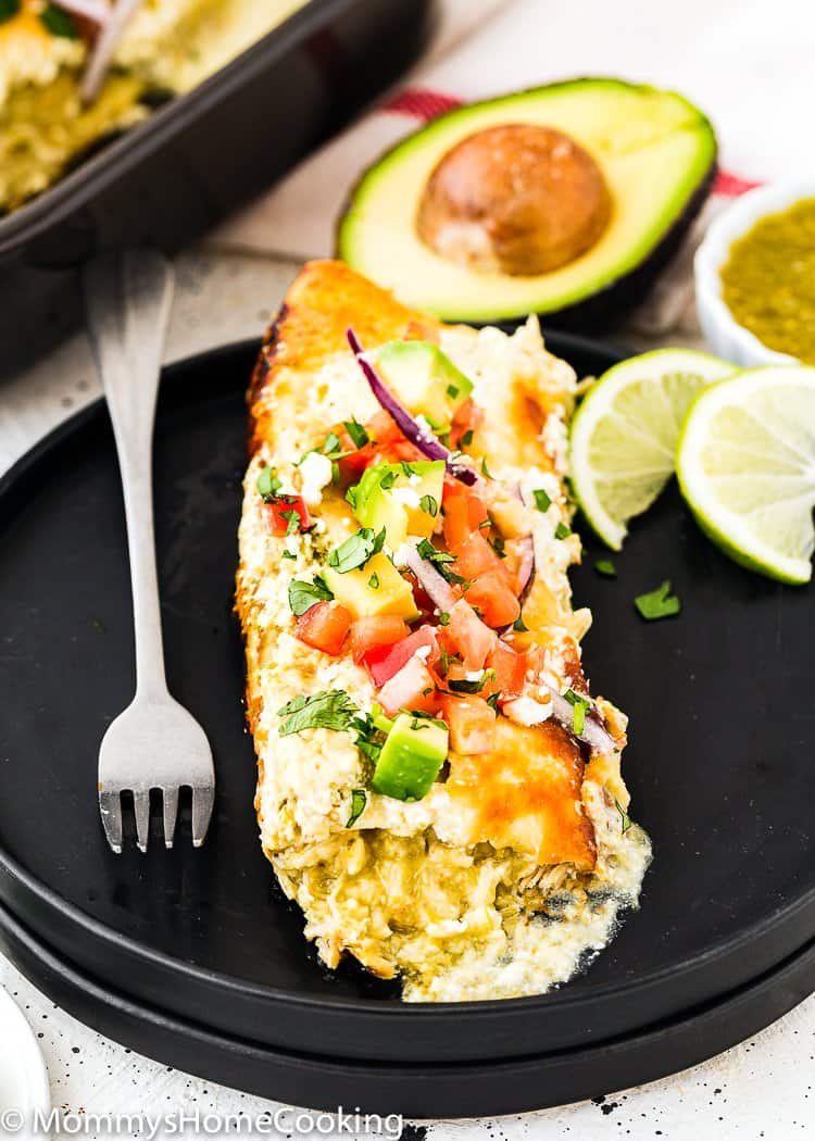 Easy Enchilada Suiza in a plate with toppings