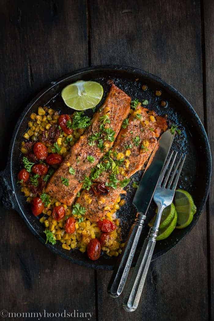 Salmon with Roasted Tomatoes and Corn-Salmon with Roasted Tomatoes and Corn is an effortless dinner that the whole family will love! Picky eaters approved. https://mommyshomecooking.com