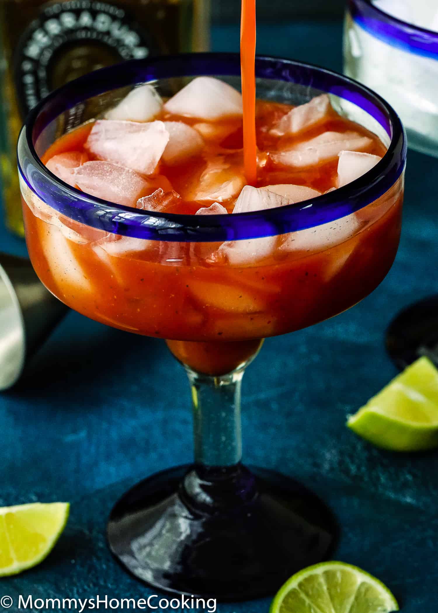 This Spicy Salsa Margarita is boozy, refreshing, citrusy and totally irresistible! This cocktail taste like the perfect combination of a bloody mary and a margarita, all in one sip. Made with fresh salsa, tequila, agave and lime, this delicious and different cocktail will knock your guests' socks off! https://mommyshomecooking.com