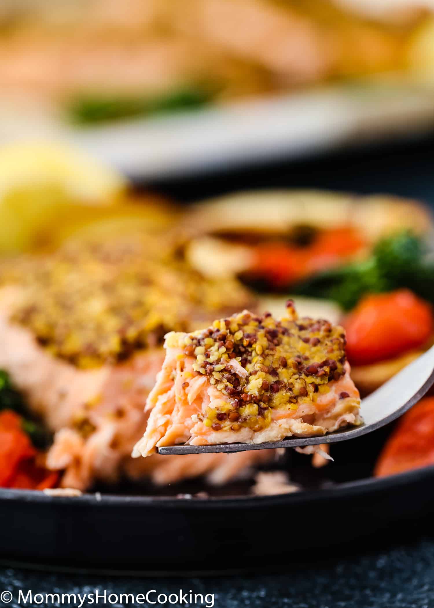 Sheet Pan with Salmon Filets, roasted potatoes, tomatoes.