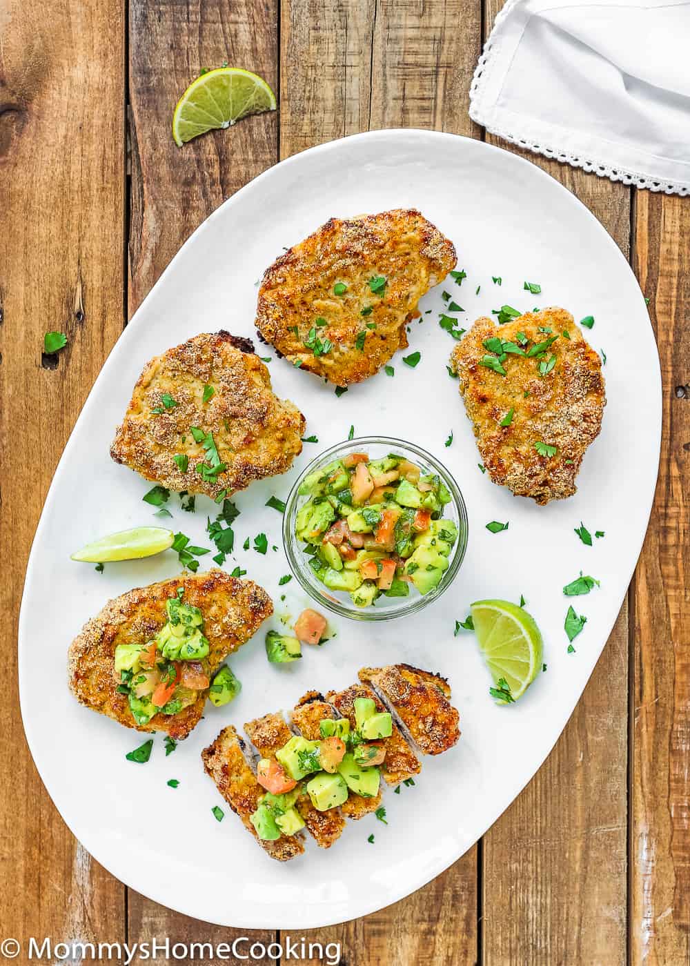 These Low Carb Breadless Skinny Oven Fried Pork Chops are super easy to make and beyond flavorful. It comes together in about 30 minutes, making it a great, and healthy, weeknight dinner. https://mommyshomecooking.com