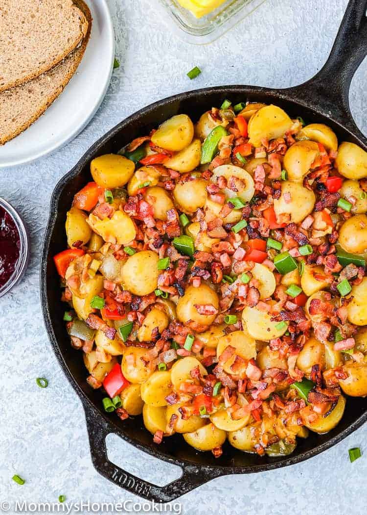 These Slow Cooker Bacon and Ham Breakfast Potatoes are perfect for breakfast, brunch, or breakfast for dinner! This recipe combines everyone’s breakfast favorites – potatoes, bacon, ham, and cheese. https://mommyshomecooking.com