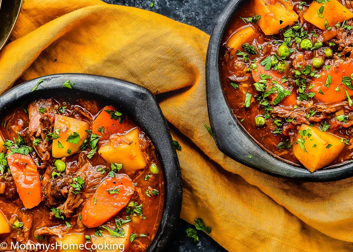 overhead view of two bowls with Slow Cooker Oxtail Stew