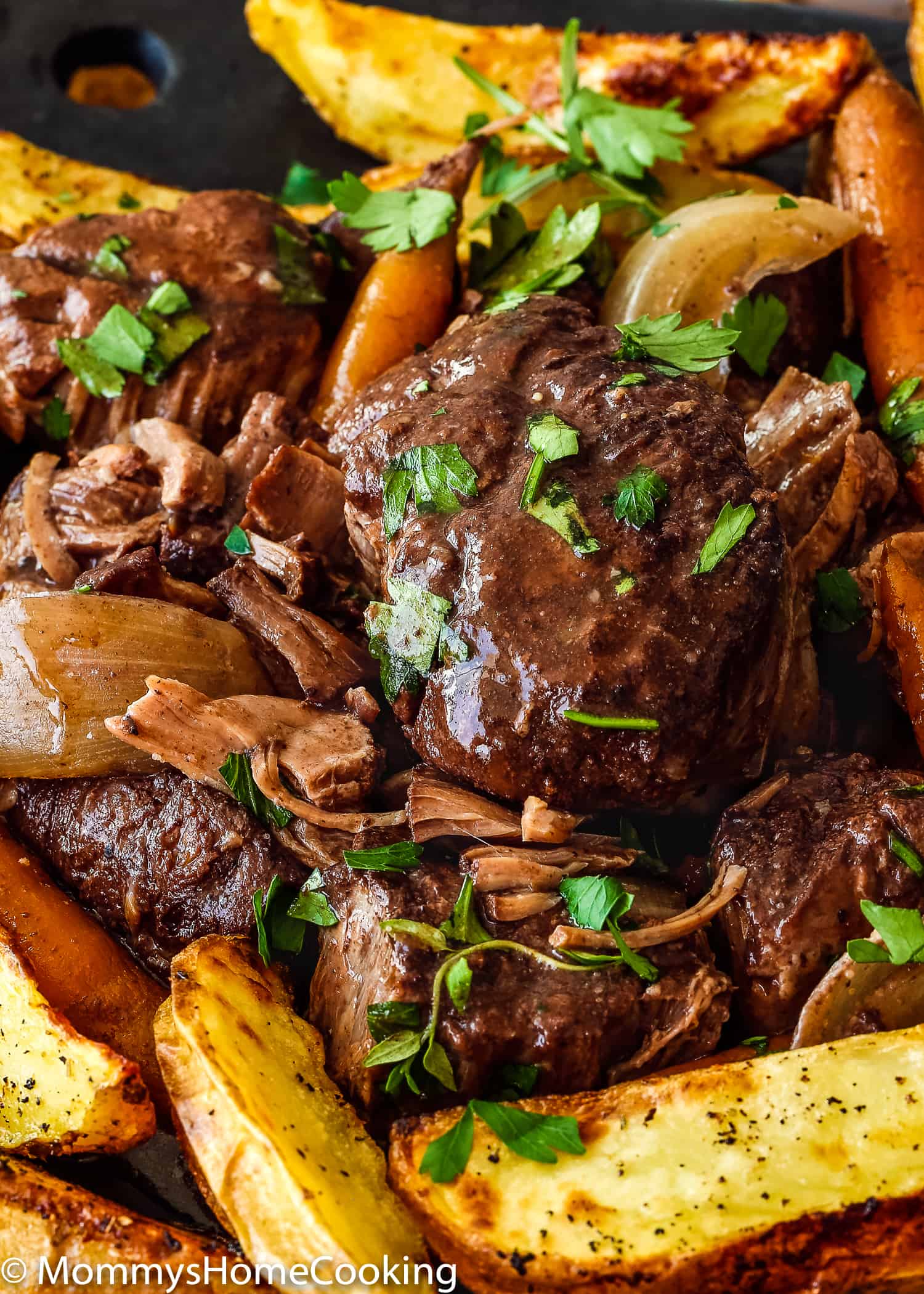 This Slow Cooker Red Wine Hind Shank is rich, hearty and super satisfying. Cook it in a slow cooker for really tender meat, this classic beef stew is enveloped in a tasty, deeply red wine flavored sauce. https://mommyshomecooking.com