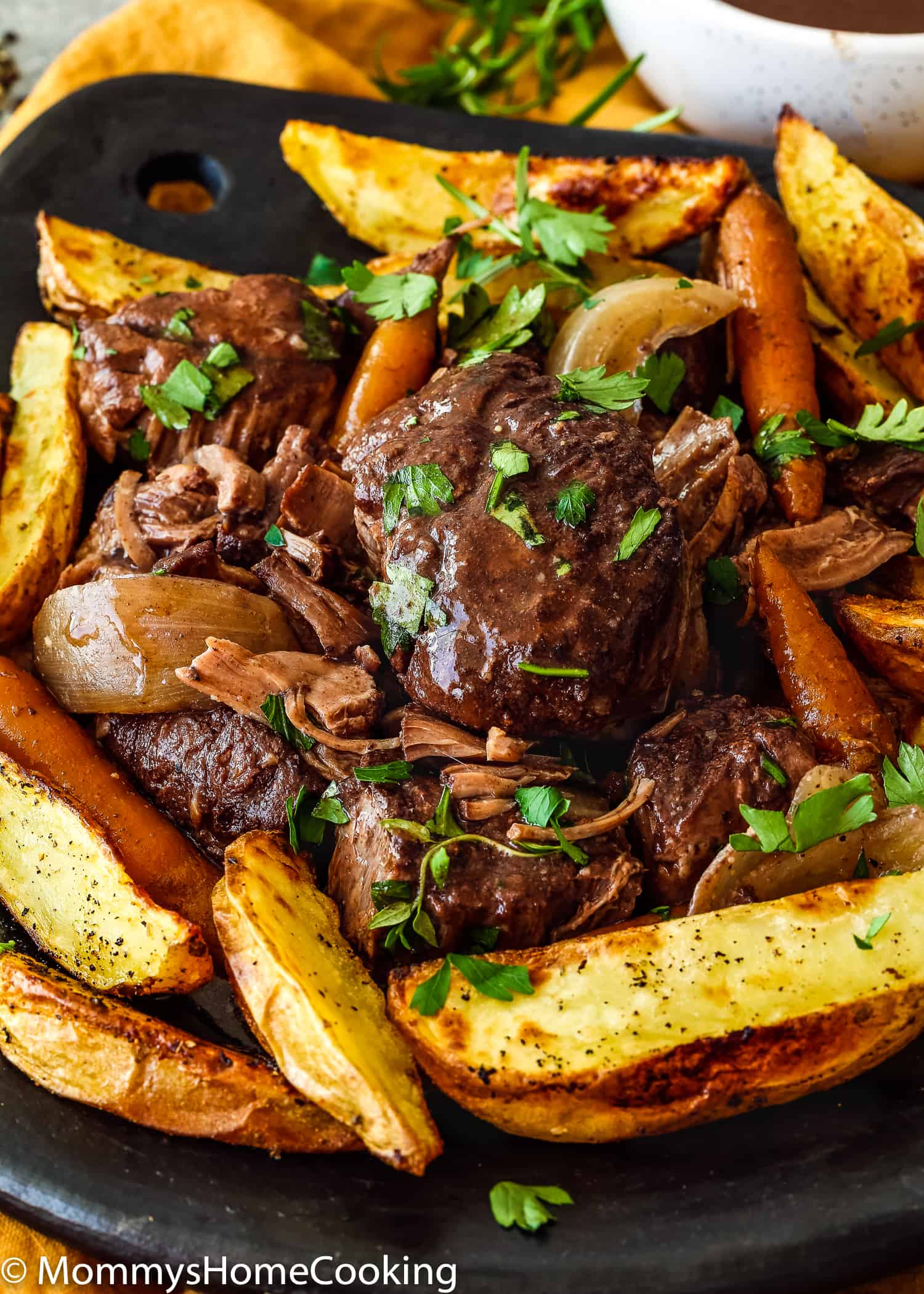 This Slow Cooker Red Wine Hind Shank is rich, hearty and super satisfying. Cook it in a slow cooker for really tender meat, this classic beef stew is enveloped in a tasty, deeply red wine flavored sauce. https://mommyshomecooking.com