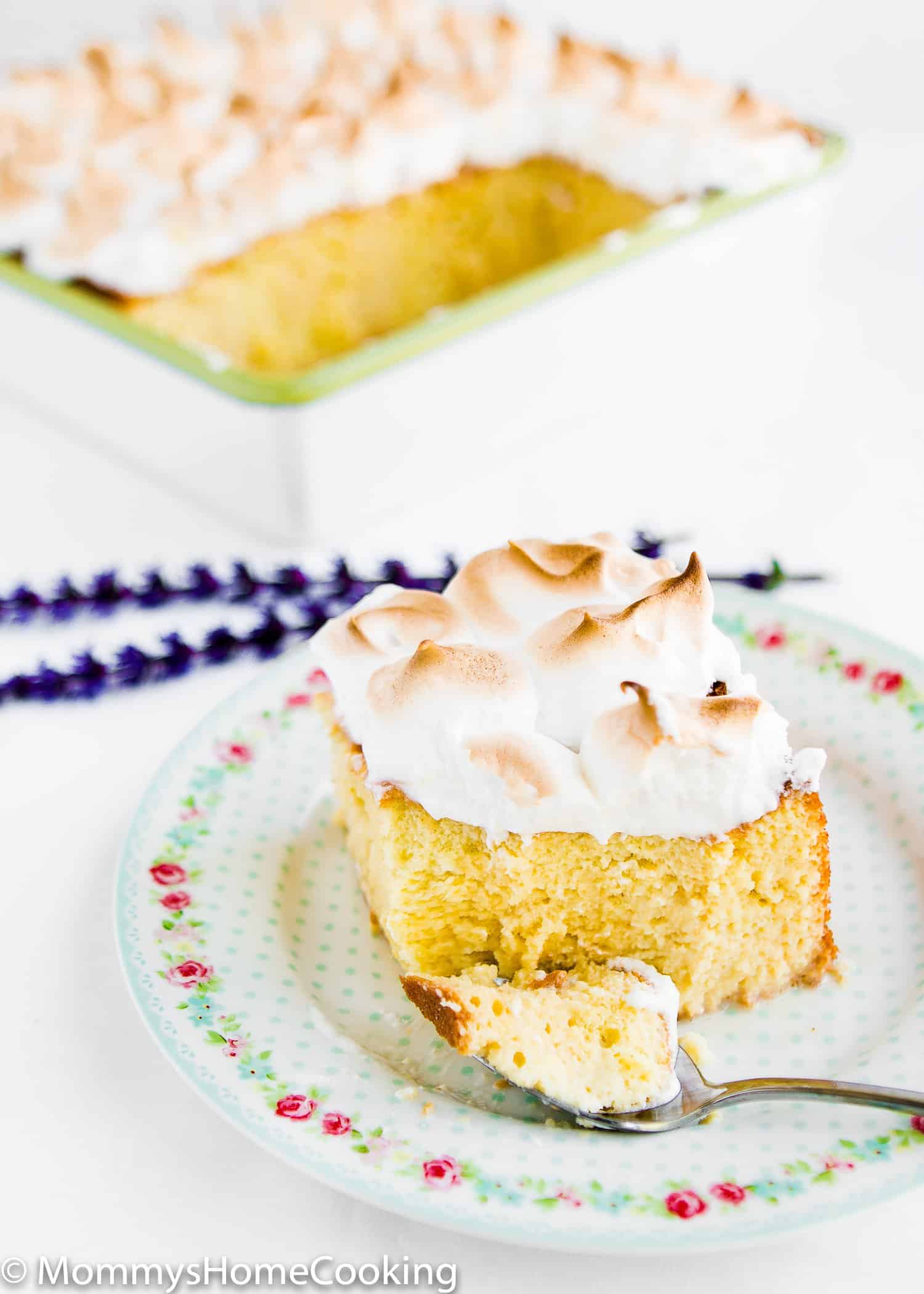 This Tres Leches Cake is amazingly delicious! An ultra luscious cake soaked in a sweet milk mixture and topped with Italian meringue. https://mommyshomecooking.com