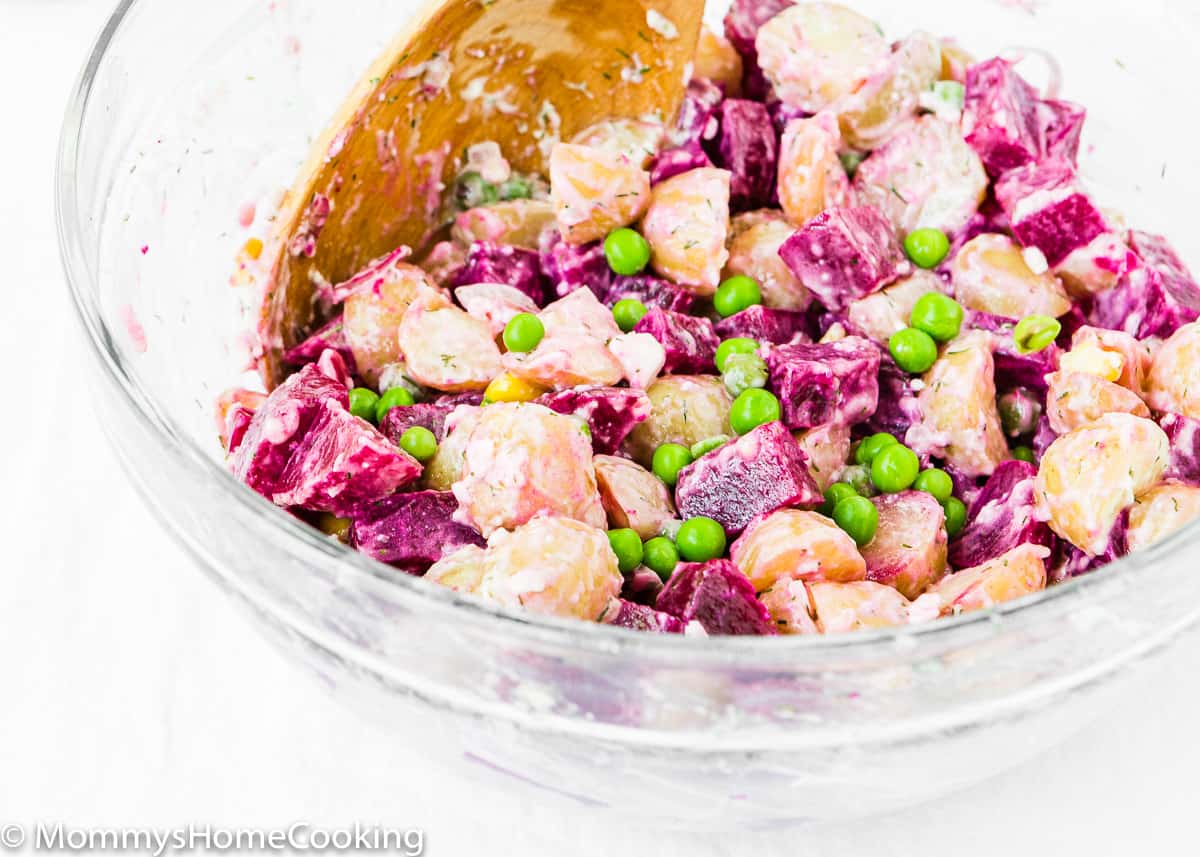 Venezuelan-Style Beet and Potato Salad in a bowl with a spoon